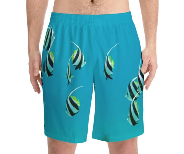 A man wearing the Men Elastic Aqua Beach Shorts