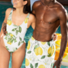 A man and woman wearing matching swimwear