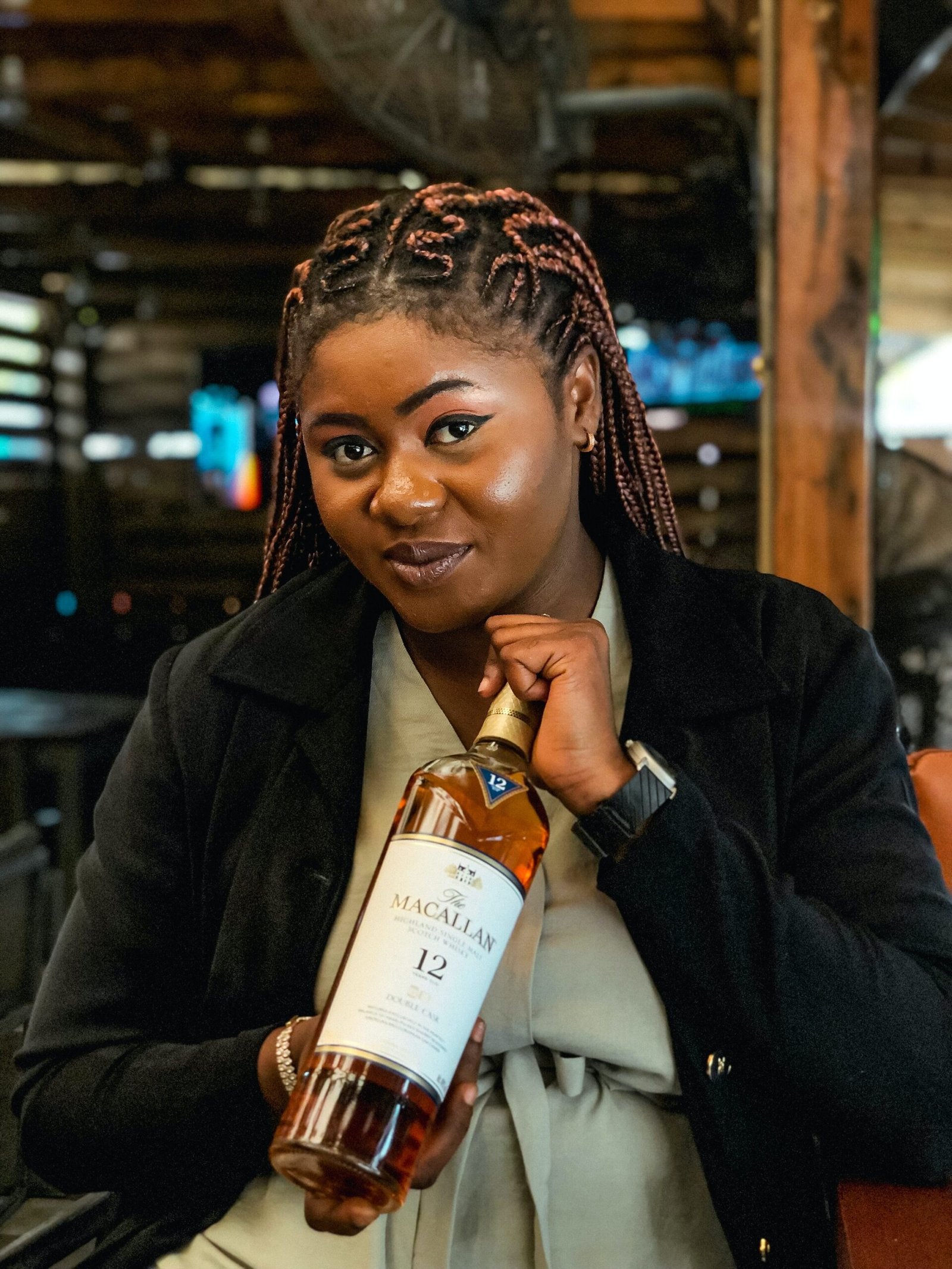 image-of-a-girl-holding-macallan
